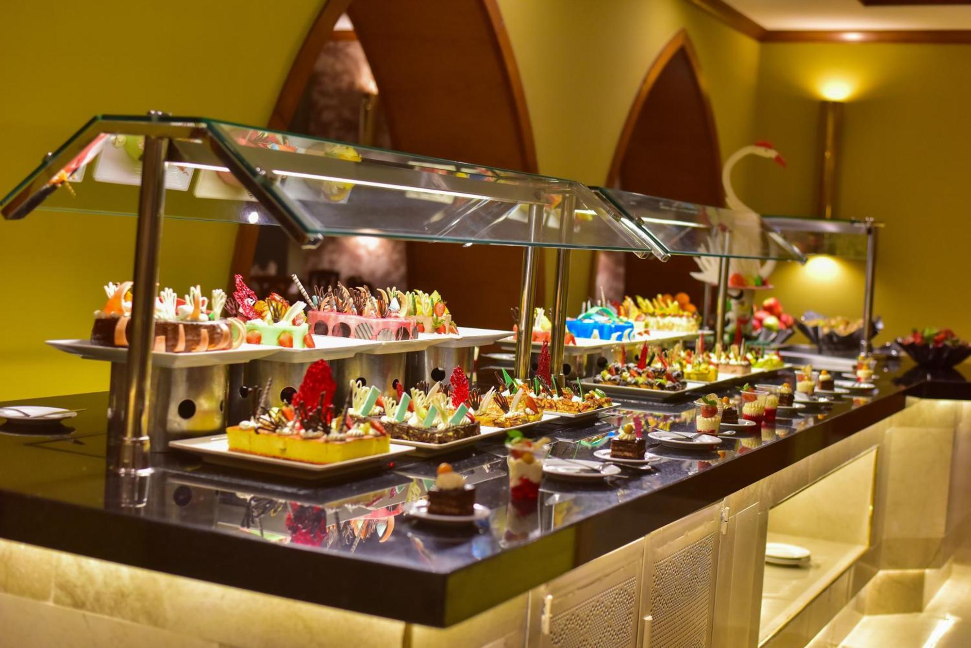 The Grand Hotel Sharm El Sheikh Εξωτερικό φωτογραφία A dessert buffet