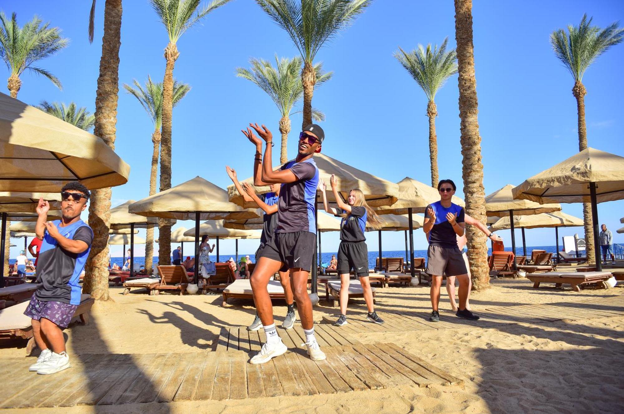 The Grand Hotel Sharm El Sheikh Εξωτερικό φωτογραφία Animation team at a resort in Egypt